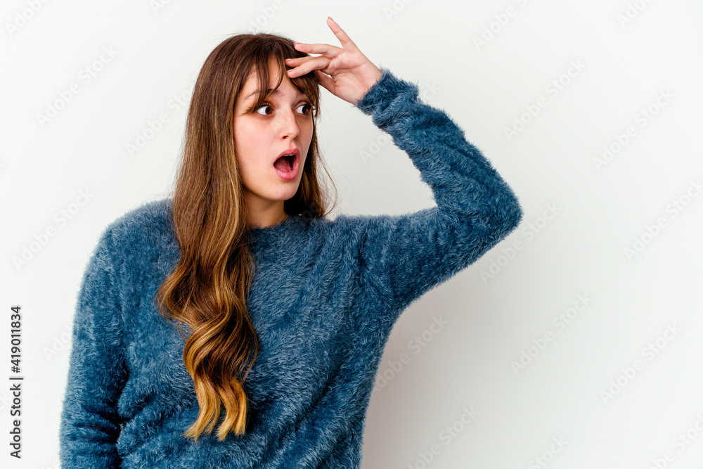 Young caucasian cute woman isolated on white background looking far away keeping hand on forehead. Young caucasian cute woman isolated on white background looking far away keeping hand on forehead.