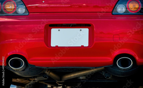 Blank White License Plate On Red Car Bumper REVISED