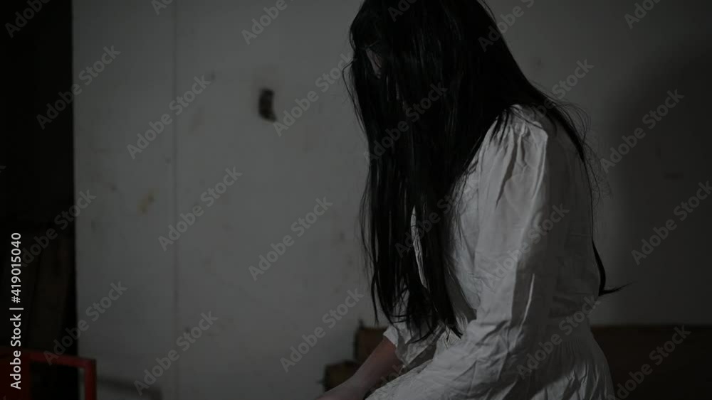 Portrait of asian woman make up ghost face,Horror scene,Scary background,Halloween poster Portrait of asian woman make up ghost face,Horror scene,Scary background,Halloween poster