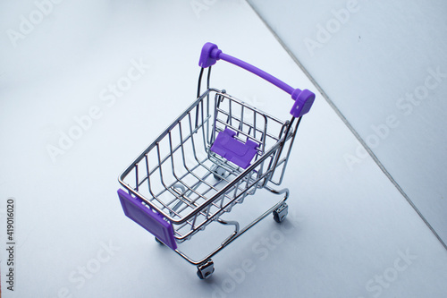 toy shopping baskets on a white background. Shopping carts.