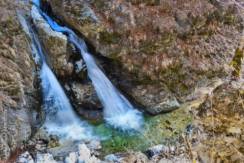 Demons mill waterfall on Cerna river, near Horezu town, Valcea, Romania photo