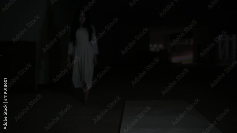 Portrait of asian woman make up ghost face,Horror scene,Scary background,Halloween poster Portrait of asian woman make up ghost face,Horror scene,Scary background,Halloween poster