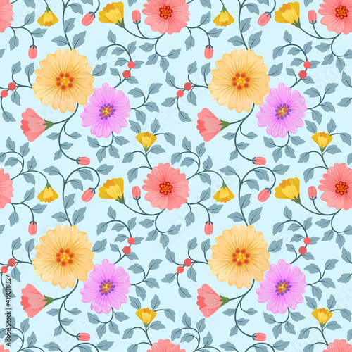 Colorful flowers on a light blue color seamless pattern for fabric textile background and backdrop. © Orlandoit