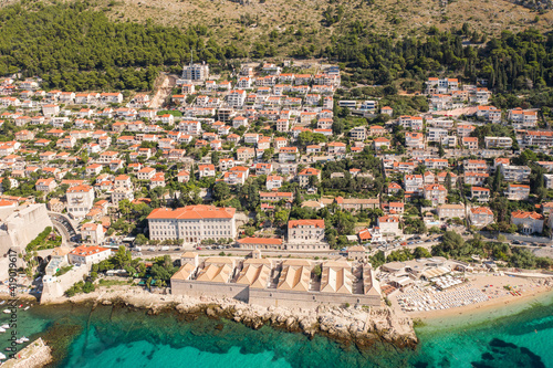 Aerial drone photo of Lazareti beasides Banje beach outside Dubrovnik old townl in Croatia summer morning