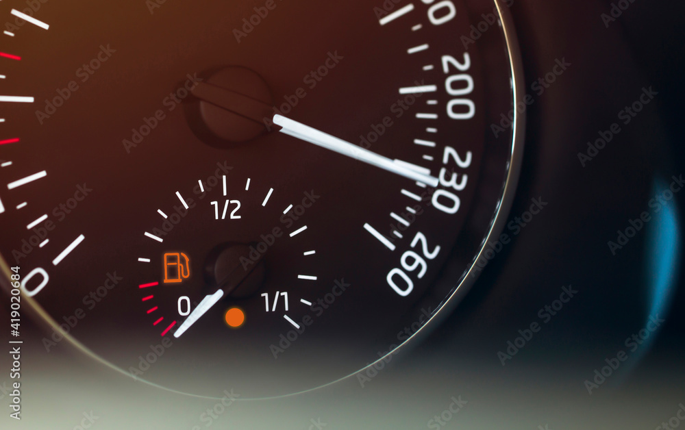 vehicle speed indicator showing excessive speed and low gas amount vehicle speed indicator showing excessive speed and low gas amount