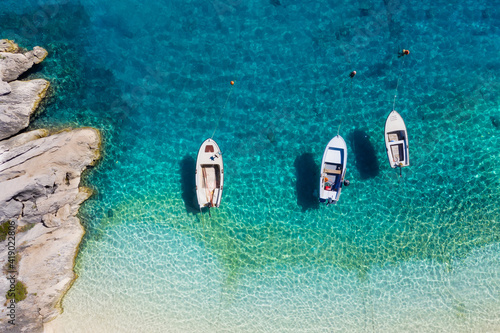 Mediterranean sea. Seascape with boats. Aerial view of floating boat on blue sea at sunny day. Top view from drone at beach and azure sea. Travel and vacation image