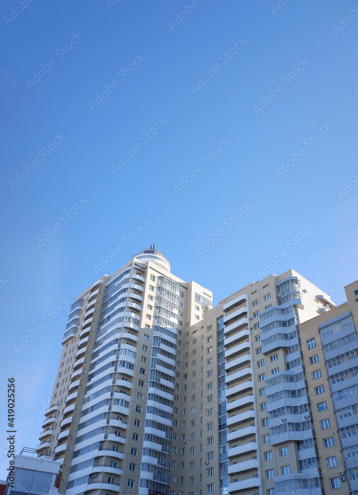 multi-storey modern residential building against the blue sky. modern housing concept
