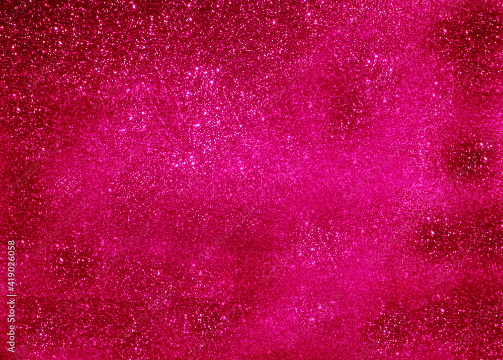 Fototapeta premium Abstract sparkling pink background with golden Christmas lights. Bokeh of Christmas garlands. The concept of the cover with glitter.