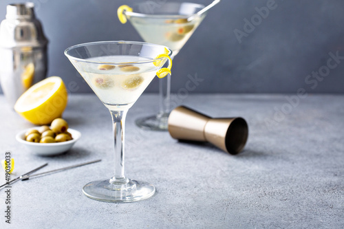 Classic lemon drop martini with olives and a lemon twist