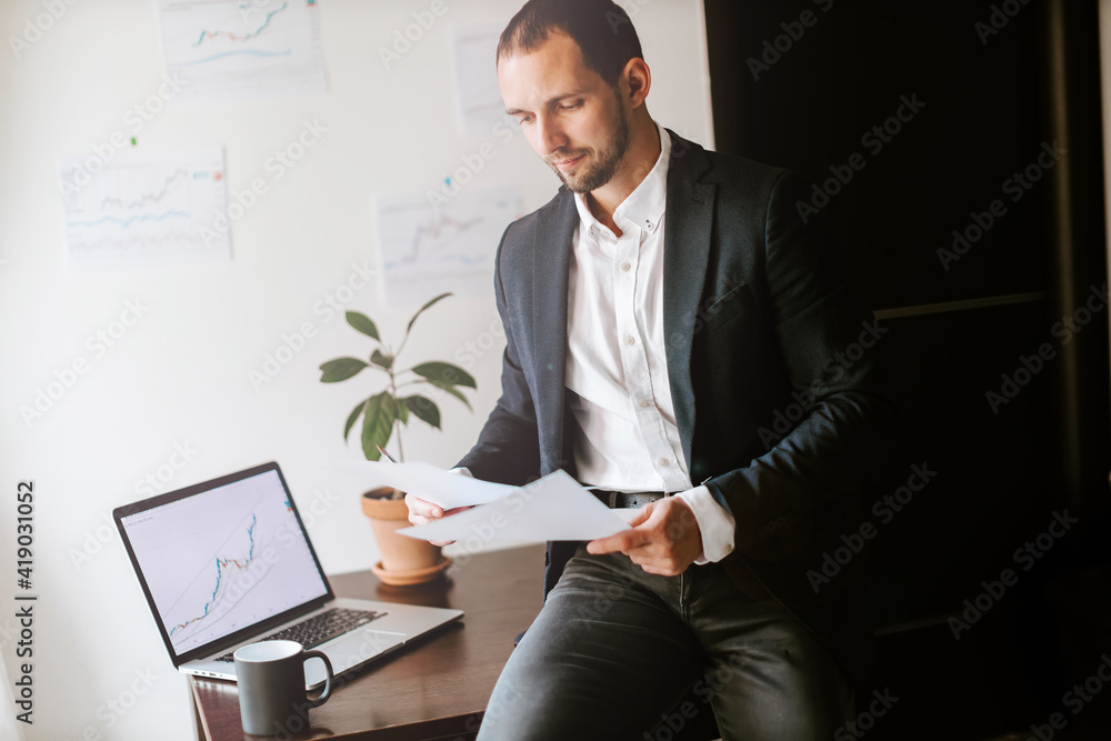 financial manager stock graph price trend analysing. Investment broker trading bitcoin crypto currency using laptop. financial manager stock graph price trend analysing. Investment broker trading bitcoin crypto currency using laptop.