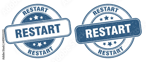restart stamp. restart label. round grunge sign