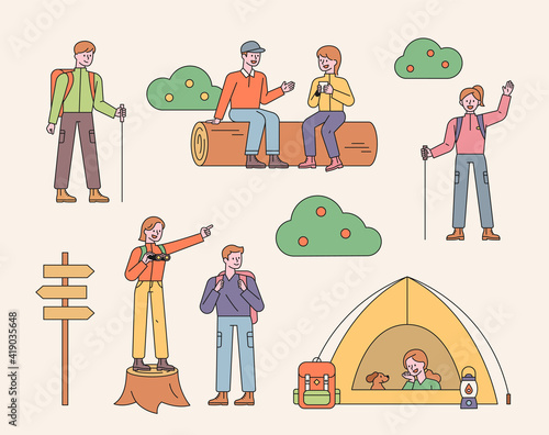 People camping and hiking. flat design style minimal vector illustration.