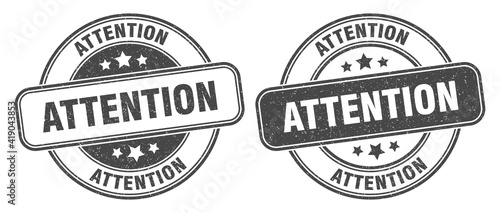 attention stamp. attention label. round grunge sign
