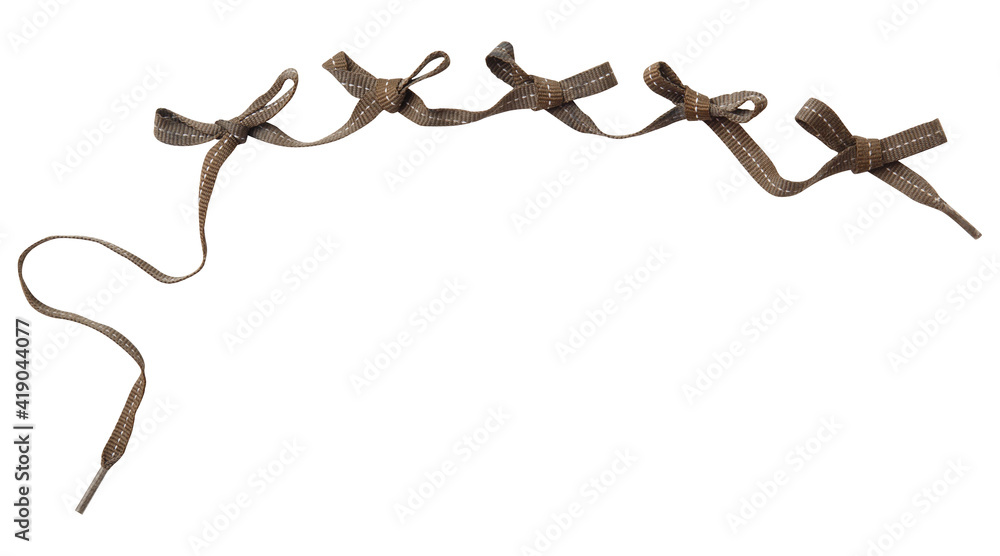 Fotografie Brown ribbon curl isolated on white background