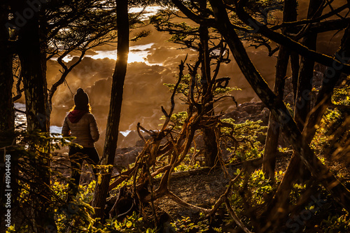 Women watching Sunset during golden hour photo