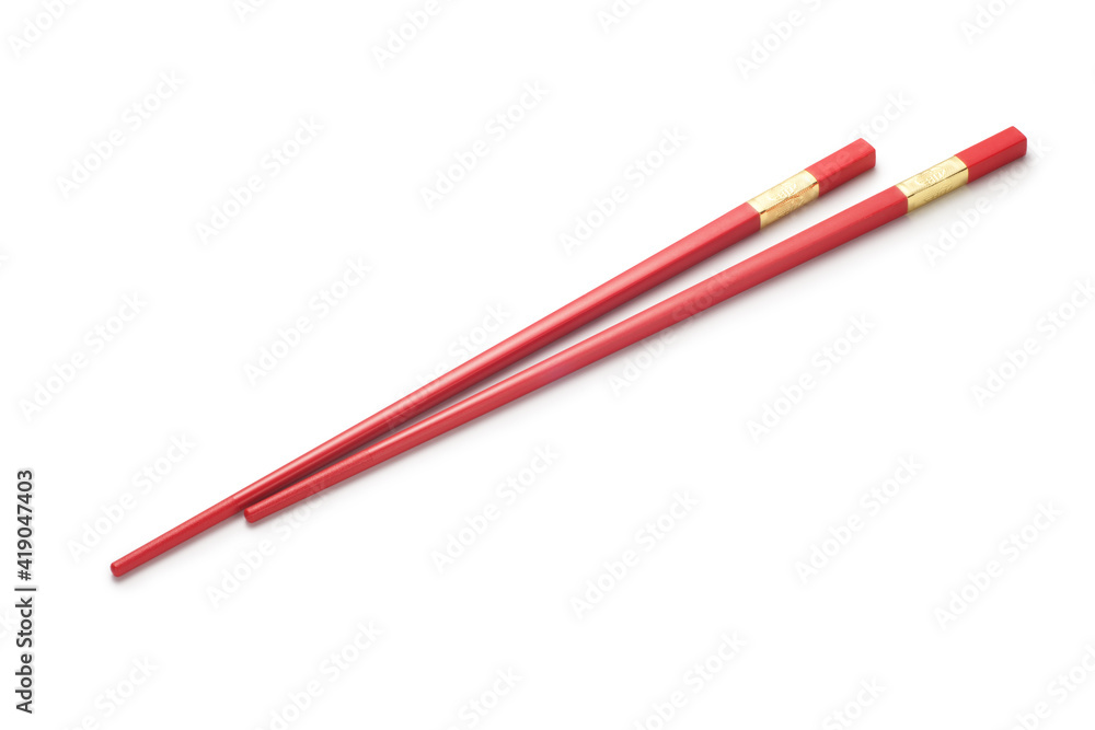Red chopsticks on white background Red chopsticks on white background