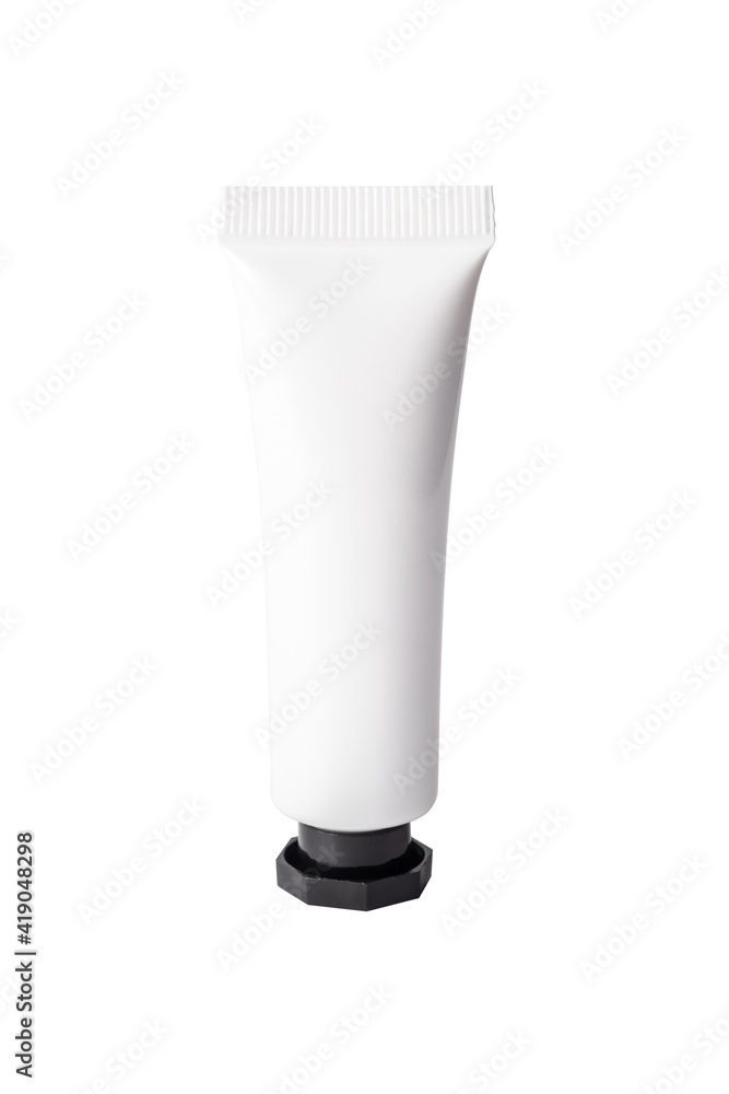 White cream tube with black cap in isolated with clipping path. White cream tube with black cap in isolated with clipping path.