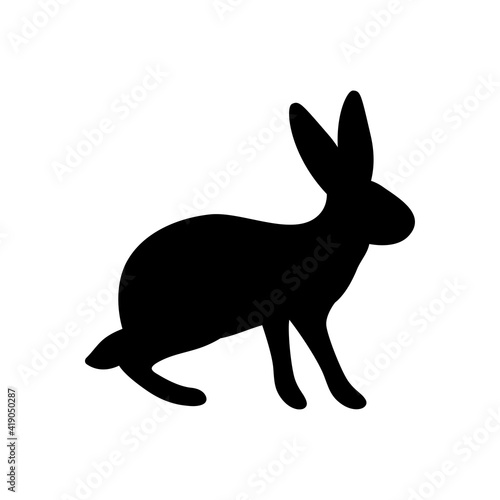 Vector illustration of a standing rabbit. Black silhouette of a hare on a white background. Doodle Style.