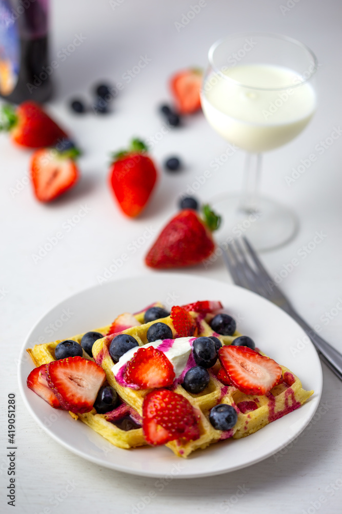 Waffles, strawberries, blueberries with yogurt Waffles, strawberries, blueberries with yogurt