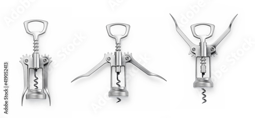 A set of three steps of metal wine bottle openers on a white background