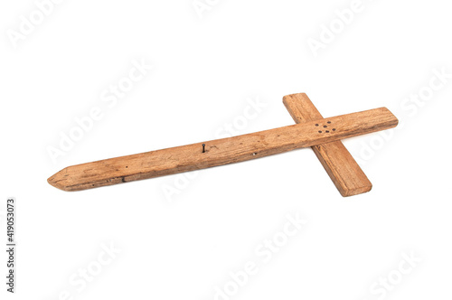 Wooden cross on white background.