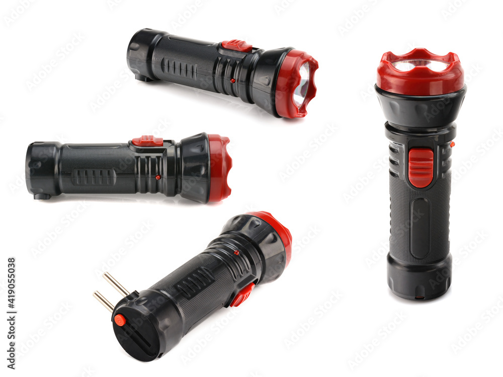 black rechargeable electric LED flashlight isolated on white background. black rechargeable electric LED flashlight isolated on white background.