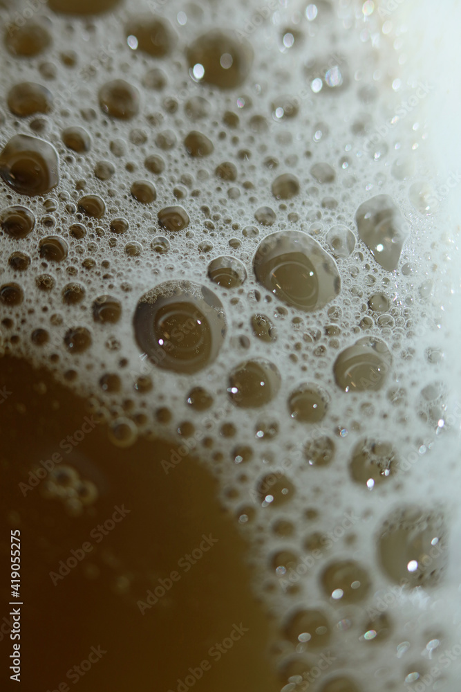 Different size of water bubbles close up modern yellow background high quality prints Different size of water bubbles close up modern yellow background high quality prints