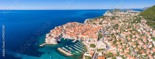 Aerial panorama drone shot of Old Port in east Dubrovnik old town in Croatia summer morning