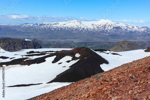 Sun over snowy landscape at Fimmvorduhals hiking trail, Iceland photo