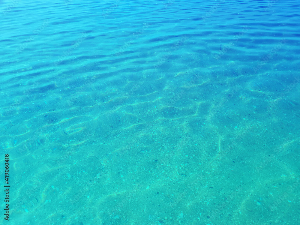 Shining blue water ripple background
