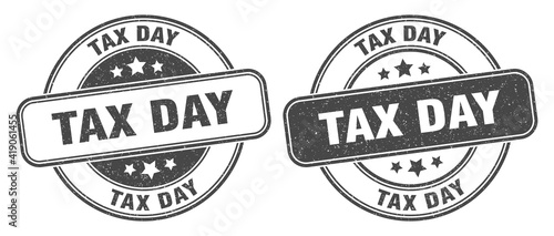 tax day stamp. tax day label. round grunge sign