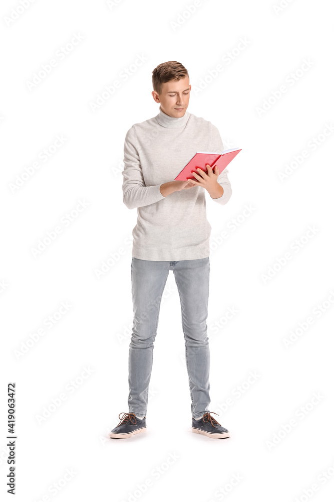 Young man reading red book on white background Young man reading red book on white background
