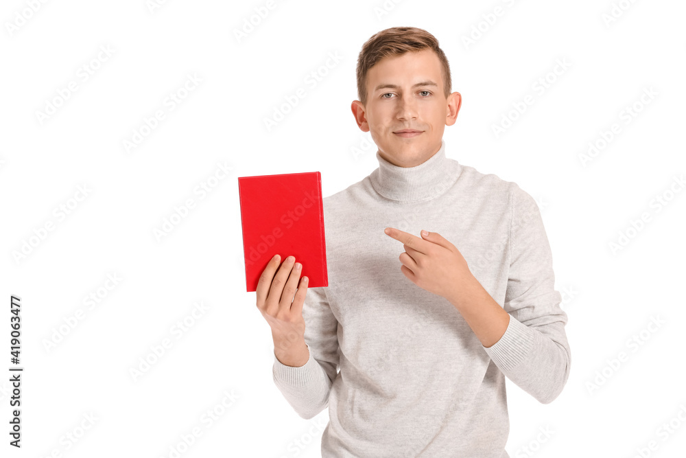Young man with red book on white background Young man with red book on white background