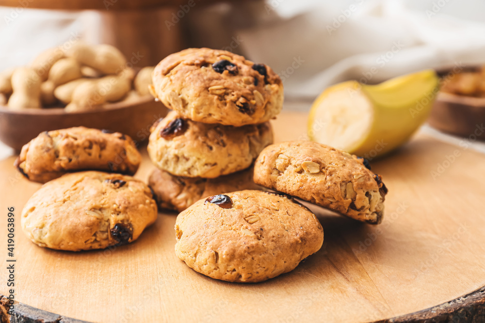 Board with tasty banana cookies, closeup Board with tasty banana cookies, closeup