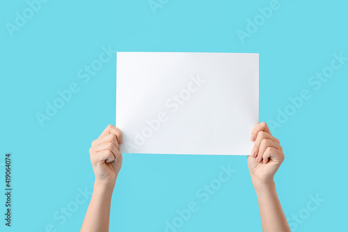 Female hands with empty pap...