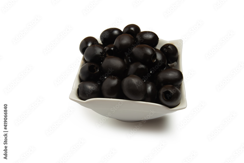 a handful of olives in a saucer isolated on a white background. pizza cooking concept. a handful of olives in a saucer isolated on a white background. pizza cooking concept.
