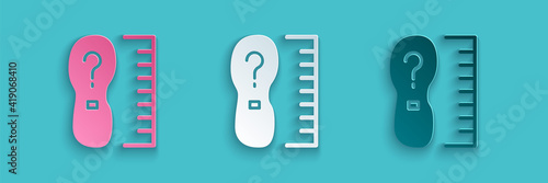 Paper cut Square measure foot size icon isolated on blue background. Shoe size, bare foot measuring. Paper art style. Vector.