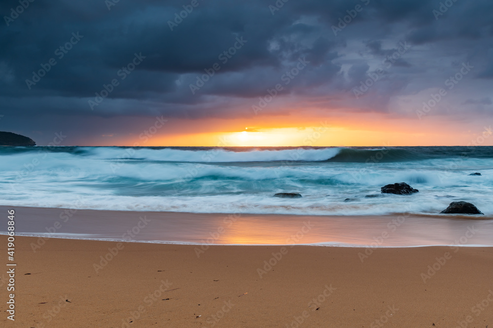 A moody overcast sunrise seascape
