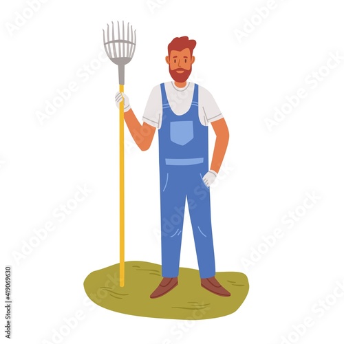 Handyman standing with rake isolated on white background. Young gardener in uniform and gloves. Colored flat vector illustration of man with garden tool at seasonal outdoor work