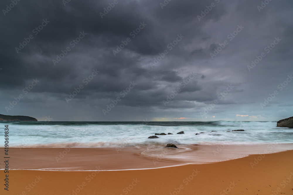 A moody overcast sunrise seascape A moody overcast sunrise seascape