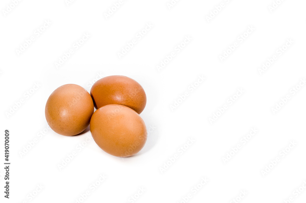 Three fresh eggs on white background. Copyu space Three fresh eggs on white background. Copyu space