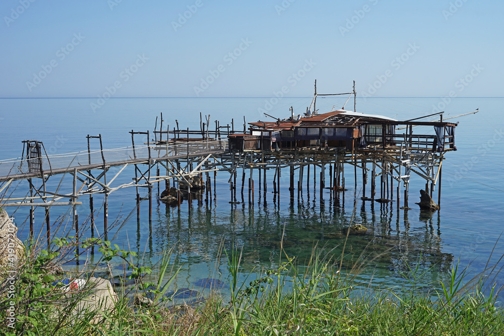 Traditional trabocco, wooden fishing house on platform of the Trabocchi Coast, Abruzzo, Italy, fishing concept