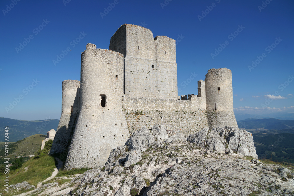 Rocca Calascio castle, medieval mountaintop fortress in Apennine Mountains landscape, travel hiking concept, Abruzzo Italy