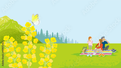 Young family enjoying picnic in springtime nature