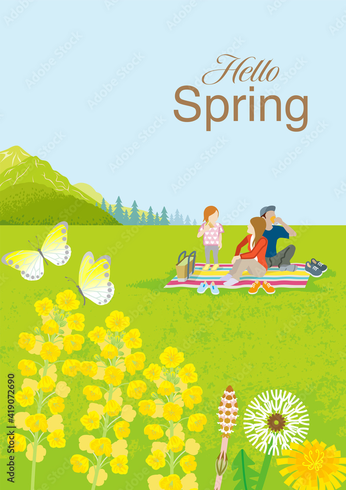 Young family enjoying picnic in springtime nature, vertical layout - Included the word 