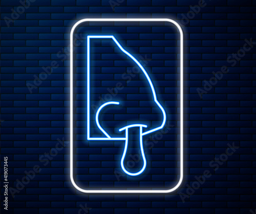 Glowing neon line Runny nose icon isolated on brick wall background. Rhinitis symptoms, treatment. Nose and sneezing. Nasal diseases. Vector.