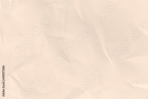 Recycled crumpled brown paper texture or paper background for design with copy space for text or image