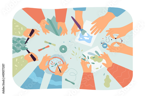 Top view of desk with handmade works of art. Children knitting, scrapbooking, sewing, embroidering, painting in craft workshop. Creative vector illustration for DIY, craftwork, hobby concept