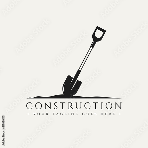 construction logo with retro shovel logo template vector illustration design. retro classic construction, engineer, builder logo concept photo