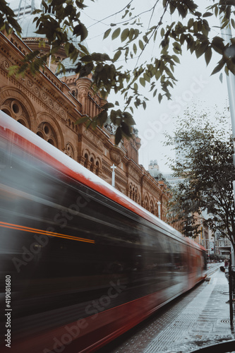 Photography Light rail motion blur in front of old building